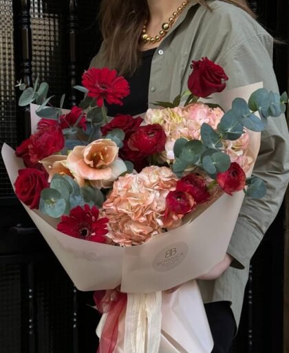 mix of red and cream blooms