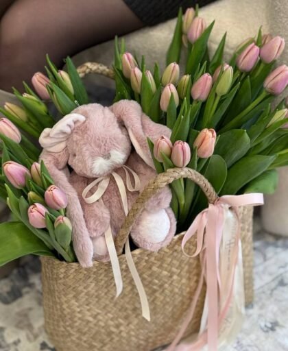 tulips in a bag with a toy
