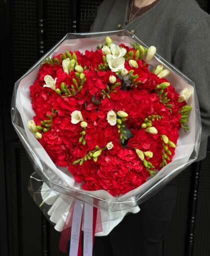 red hydrangeas with freesia bouquet